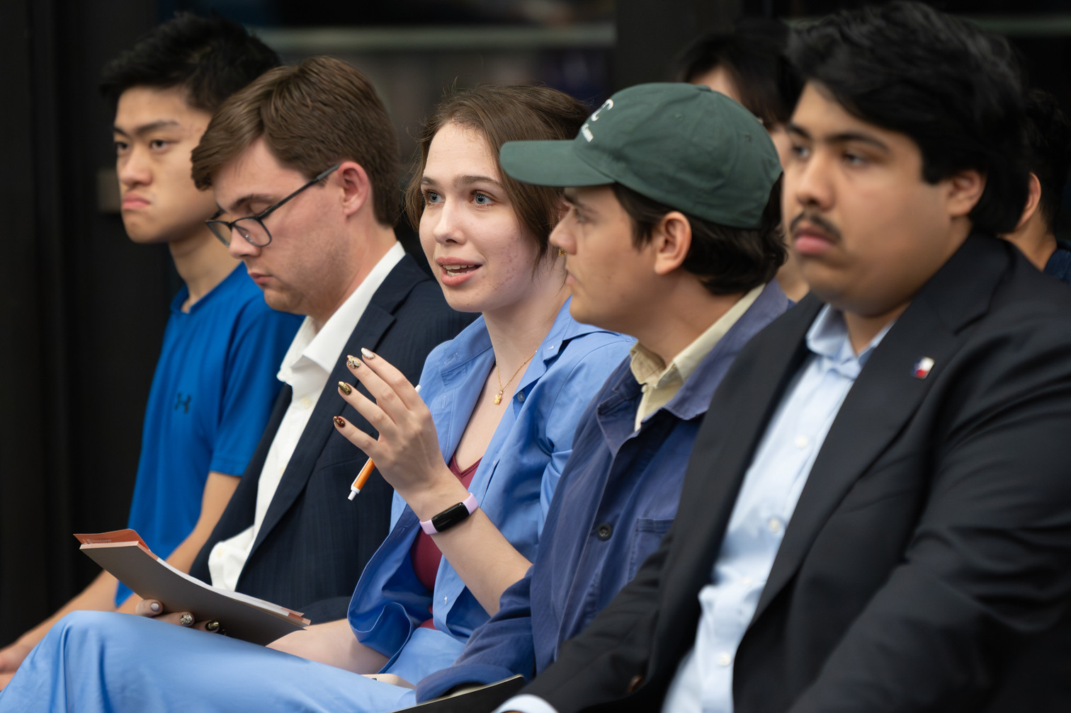 Students listening during a Forum session