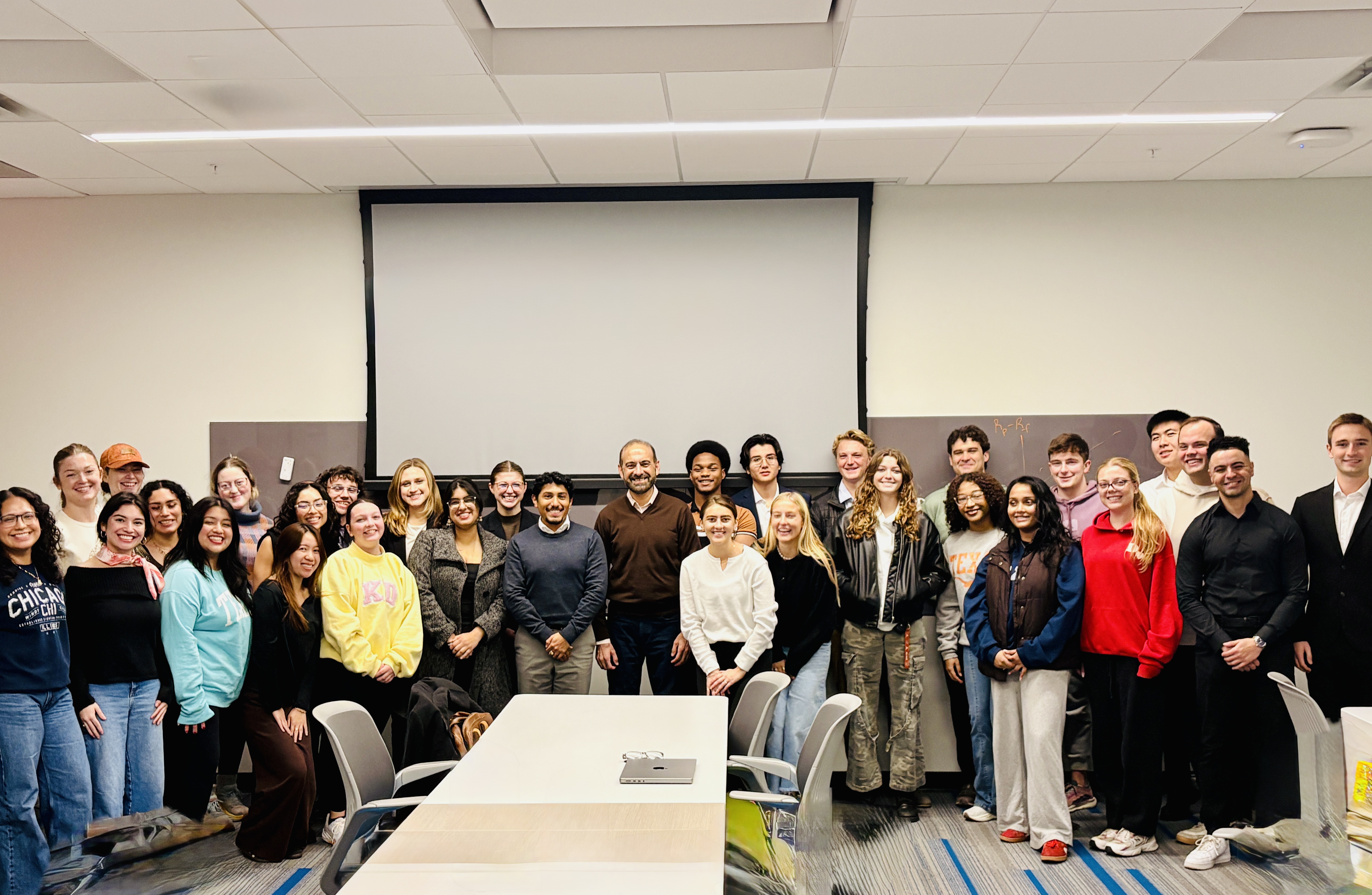 Dilawar Syed teaching a classroom at UT Austin